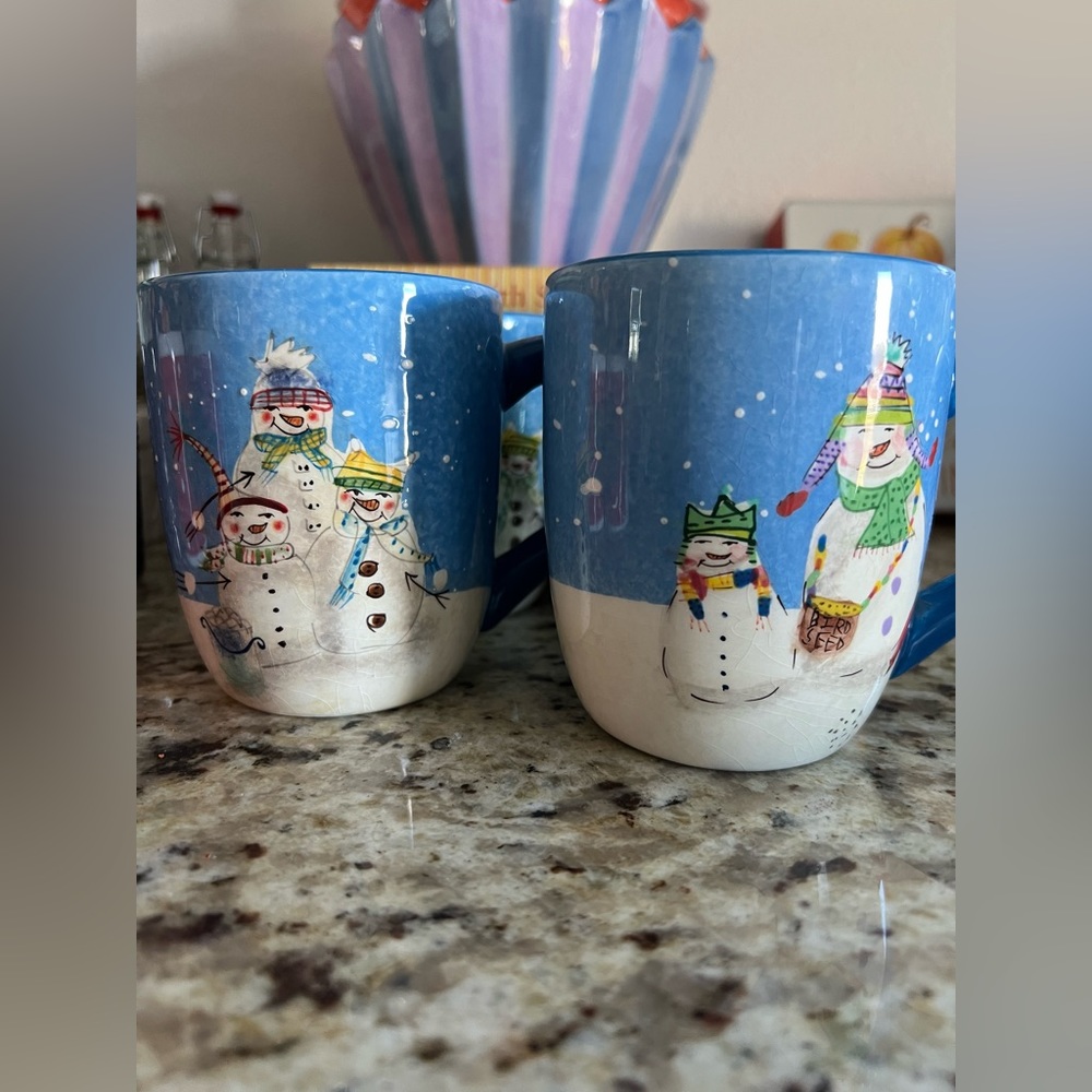 Set of four Christmas mugs by Oneida.Snow folks collection. Debbie Taylor-Kerman